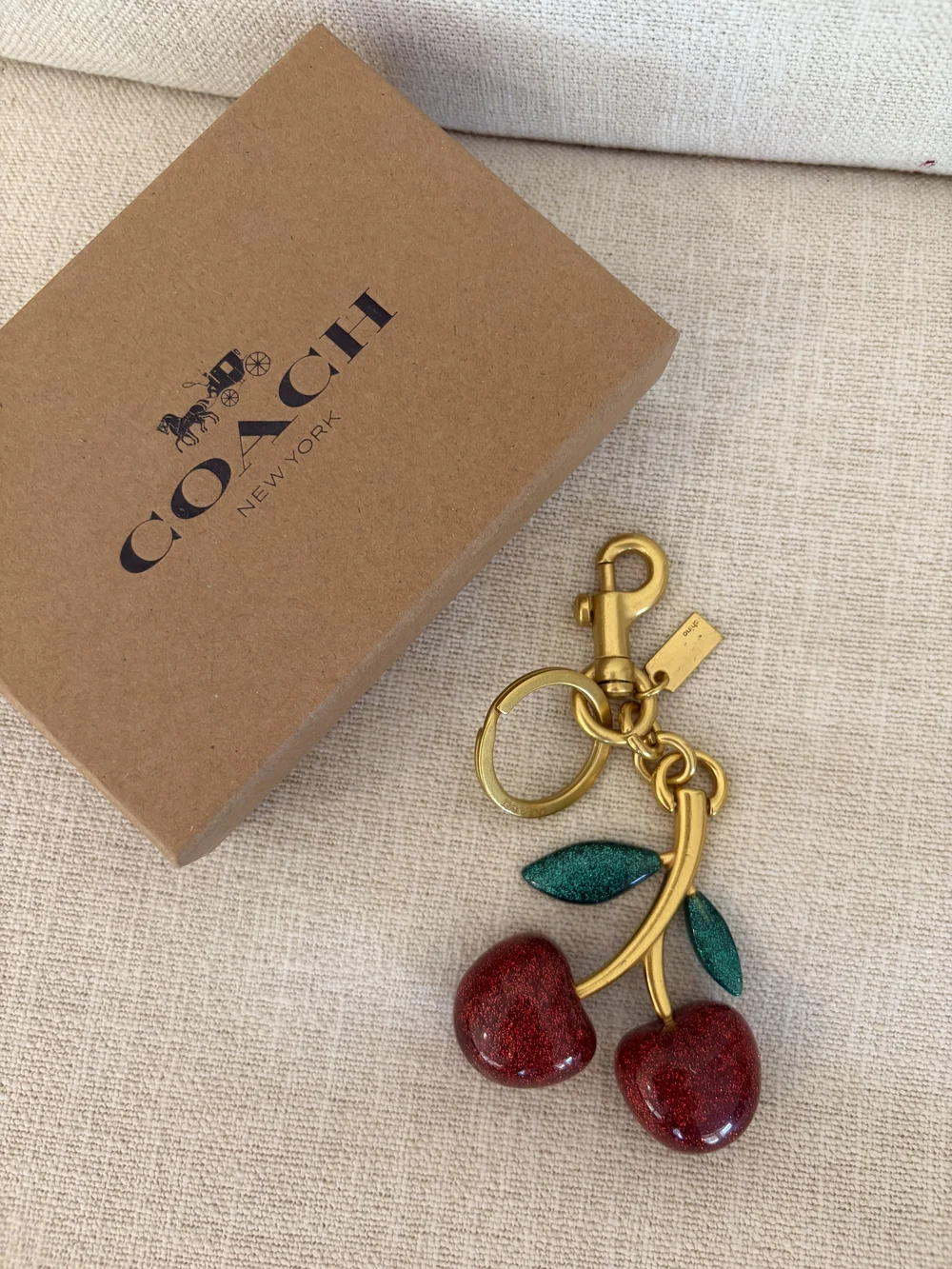 Coach Gold-Tone Cherry Keyring with Red Enamel Cherries and Green Leaves